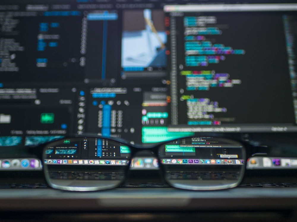 Cisco agentic AI https://www.pexels.com/photo/data-codes-through-eyeglasses-577585/